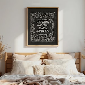 May include: A framed black print with white floral illustrations and text. The text reads: "YOUR CUSTOM QUOTE, POEM, VERSE OR LYRICS LIVE HERE. PERFECT FOR A GIFT OR A MEMORABLE KEEPSAKE FOR YOUR OWN SPACE."