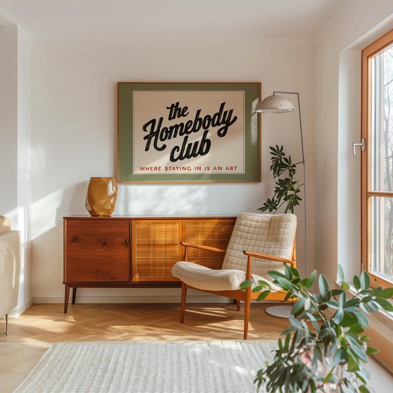Modern retro wall décor with the phrase “The Homebody Club,” perfect for living rooms, bedrooms, or reading nooks.