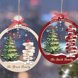 May include: Two round Christmas ornaments with a red and white gingham bow. Each features a green Christmas tree, a snowy signpost with names, the text Merry Christmas, 2025, and family names. One ornament has a light wood frame, the other red.