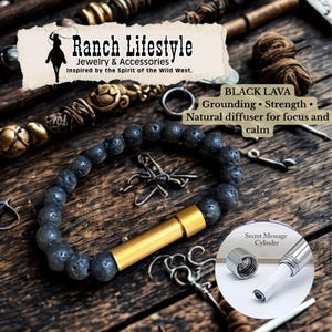 May include: A black lava stone bracelet with a gold-colored cylinder clasp. The bracelet is displayed on a rustic wooden surface with the text "Ranch Lifestyle" and "Secret Message Cylinder". The bracelet is designed for grounding and strength.