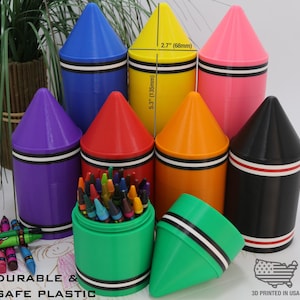 May include: Set of 7 colorful crayon holders, each shaped like a crayon. The holders are 5.3 inches tall and 2.7 inches wide. The holders are made of durable and safe plastic. The holders are 3D printed in the USA.