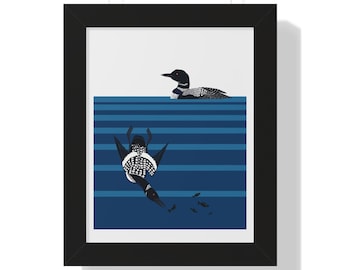 May include: A black and white loon dives into blue water with a shoal of small fish swimming below. Another loon is swimming on the surface of the water.