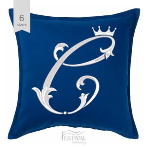 May include: A royal blue cushion with a white embroidered letter C with a crown above it. The cushion is available in 6 sizes.
