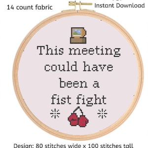 May include: A white embroidery hoop with the text "This meeting could have been a fist fight" and two red boxing gloves. The hoop is 5.7 inches wide and 7.14 inches tall.