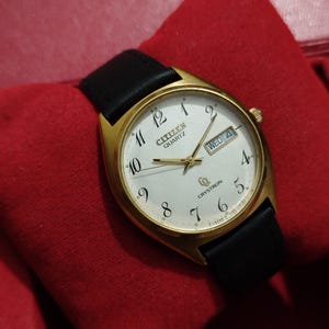 Vintage Citizen CQ Crystron Quartz Golden Case 4-730976 35MM SEPT 1999 JDM