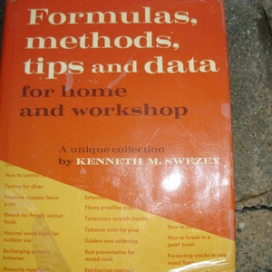 May include: A vintage book titled "Formulas, methods, tips and data for home and workshop" by Kenneth M. Swezey. The cover is orange with white text. The book's topics include home improvement and repair.
