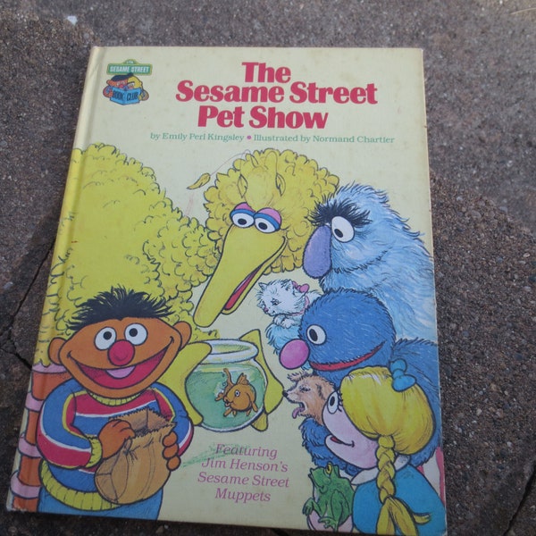 Vintage Book The Sesame Street Pet Show by Emily Perl Kingsley Illustrated by Normand Chartier Featuring Jim Henson's Muppets.