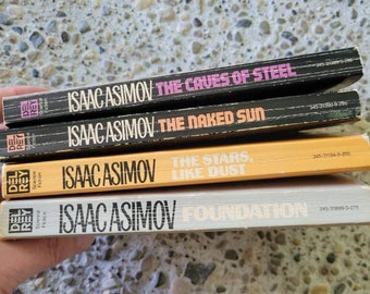Isaac Asimov Paperback Books The Caves of Steel, The Naked Sun, Foundation and The Stars, Like Dust