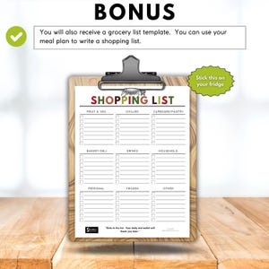 May include: A wooden clipboard with a shopping list template. The list is divided into categories like fruit & veg, chilled, and cupboard/pantry. The text "SHOPPING LIST" is at the top. Includes a bonus grocery list template. The text "Stick this on your fridge" is on a green sticker.