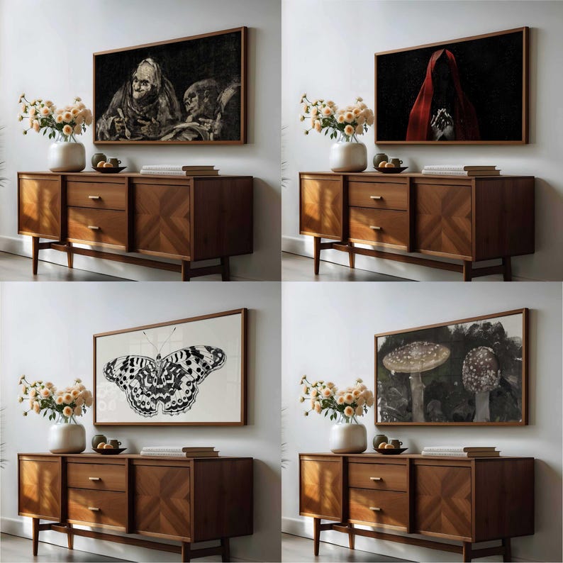 4 Halloween art frame TV images mocked up in an art TV in a living room on the wall above a sideboard with dried flowers and books on.