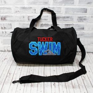 Personalized Swim Duffle Bag//Black and blue swim team competition Shown on a Small Black Duffle