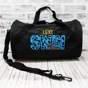 Personalized Swim Bag For Swim TeamBlue Leopard Shown on a Small Black Duffle