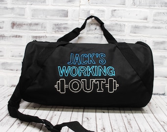 May include: Black duffel bag with a blue and white embroidered design that says "Jack's Working Out" with a dumbbell graphic.