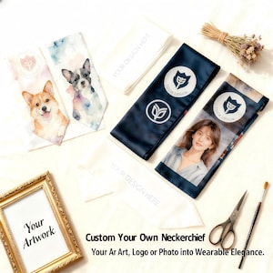 May include: A selection of custom neckerchiefs with diverse designs. Some feature watercolour pet portraits, while others display logos and a photo. The text "YOUR DESIGN HERE" is printed on white neckerchiefs. The phrase "Custom Your Own Neckerchief" is also visible.