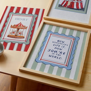 A timeless How Wonderful Life Is Now You’re In the World nursery print in soft sage green tones with classic stripes and a vintage circus feel. Perfect for playroom wall art, kids wall art, and baby room wall decor. This heartfelt nursery quote print adds warmth and meaning to any space, pairing beautifully with sage green nursery art and traditional circus nursery themes. Ideal for parents who love vintage playroom art and storybook-inspired design.