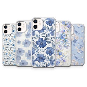 May include: Set of five phone cases featuring different floral patterns in shades of blue and white. The cases are clear and show the phone's design through the back.