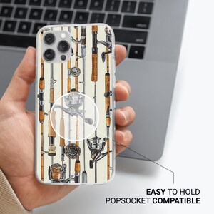 May include: A clear phone case with a colorful illustration of fishing rods and reels. The case is compatible with a popsocket.