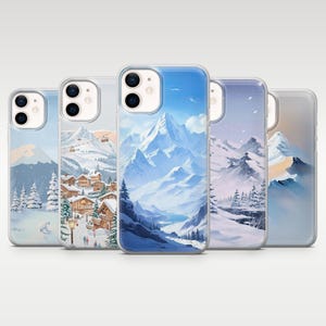 Peut inclure: Cinq coques de téléphone avec des paysages d'hiver. Les coques présentent des montagnes enneigées, des pins et des villages, avec des tons de bleu, de blanc et de marron. Chaque coque a une protection transparente.