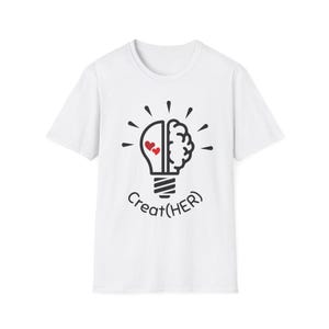 May include: White t-shirt featuring a black and red graphic of a lightbulb split in half, with a brain on one side and two hearts on the other. The text "Creat(HER)" is below the graphic.