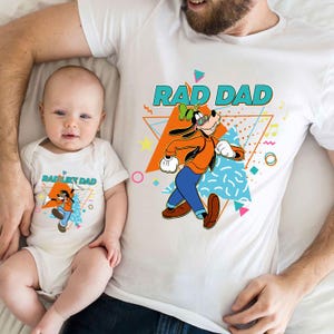 May include: White t-shirts with a cartoon dog wearing sunglasses and the text "Rad Dad" and "Rad Like Dad".