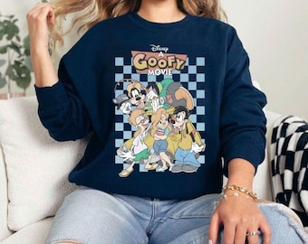 May include: Navy blue sweatshirt featuring a graphic from Disney's "A Goofy Movie." The design includes Goofy, Max, and other characters against a checkered background. The text "Disney A Goofy Movie" is displayed above the characters.