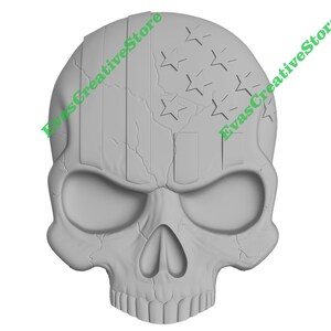 May include: A gray skull sculpture with an American flag design. The top of the skull features star cutouts and vertical stripes. The skull has a cracked, weathered appearance, with deep eye sockets and a prominent nasal cavity.