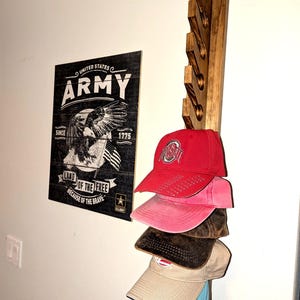 6-slot length shown loaded with five baseball caps to demonstrate spacing; 10-hat rack available.