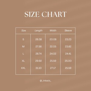 Size chart in inches for unisex zip hoodie showing measurements for sizes S, M, L, XL and XXL including length, width and sleeve length on a beige background.