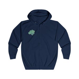 A rich navy blue full-zip hoodie adorned with a small Anahata chakra symbol on the right chest. Comfortable fit and elegant design for mindful living.