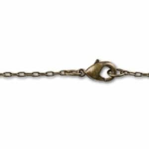 May include: Close-up of an antique brass-colored necklace chain with an oval link design. The chain is connected with a lobster clasp. The necklace is displayed against a white background.