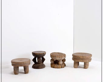Set of 4 African carved wood stools