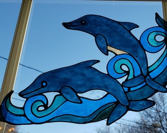 Dolphins jumping in swirling waves Window Cling