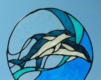 Dolphins jumping in wave stained glass window Cling