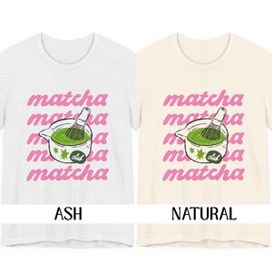 Ash and natural matcha club shirt color options with pink lettering and green drink design for matcha lovers and tea drinkers.