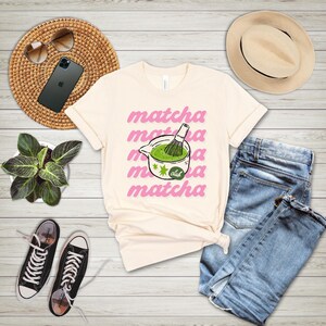 Natural matcha club shirt flat lay with cafe-inspired styling, trendy matcha tee for tea lovers, baristas, and matcha drinkers.
