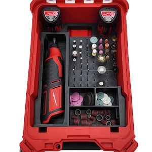 May include: Red and black power tool kit with a selection of attachments. The kit includes a rotary tool, batteries, and grinding, polishing, and cutting accessories. The case is red with black interior organisers.
