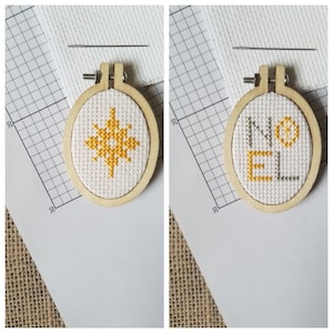 May include: Two small, round, wooden embroidery hoops with white fabric and yellow embroidery. One hoop features a yellow star design and the other says "NOEL" in yellow letters with a small yellow star.