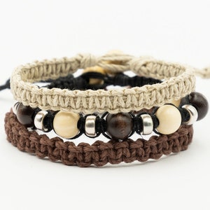 Handmade  hemp surfer  bracelets, set of 3, made with natural  hemp cord, wood and  metal beads.  The bracelet can be made   with either a bead and loop clasp, slider knot  or loose ends to tie.
