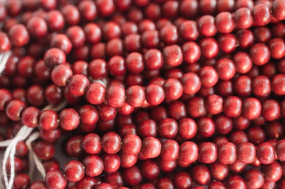 Wooden Beads 8mm, Red color, 100 beads strung on a 14 inch white string  -B2881