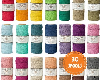 May include: A collection of 30 spools of hemp cord in various colors, including red, orange, yellow, green, blue, purple, pink, beige, and gray. Each spool is labeled with "HEMP CORD".