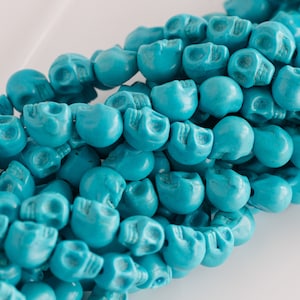 Turquoise Skull Beads 10mm,   blue sugar skulls, 38 piece strand -B3176