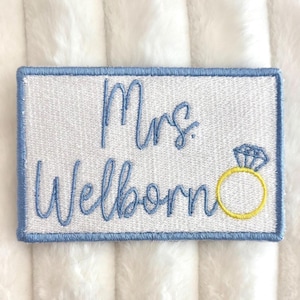 May include: A set of three ceramic mugs with a speckled, matte finish. The mugs are in shades of cream, light gray, and dark gray. Each mug has a simple, minimalist design, suitable for coffee or tea.