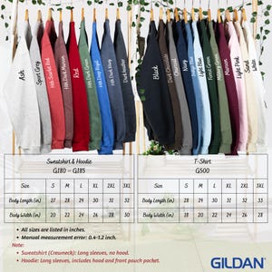 May include: A display of Gildan sweatshirts and t-shirts in various colors, including Ash, Sport Grey, and Red. The image shows the size chart with body length and width measurements in inches. Sweatshirts are crewneck style, and hoodies have a front pouch pocket.