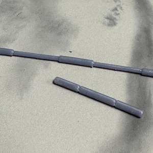 Robin’s staff and baton