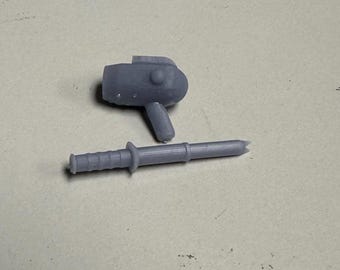 A arma e o bastão de choque do Besouro Azul