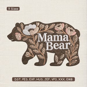 May include: A brown bear silhouette with floral accents and the words "Mama Bear" in white. The bear is decorated with white and pink flowers and tan leaves. The image also includes the text "9 Sizes" and embroidery file formats.