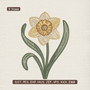May include: Embroidered daffodil design with yellow petals, a brown center, and green leaves. The image includes the text "9 Sizes" and file format abbreviations: DST, PES, EXP, HUS, JEF, VP3, XXX, EMB. The design is on a textured, off-white background.
