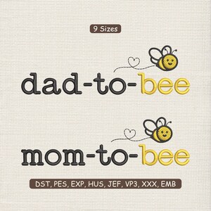 May include: An embroidered design featuring the phrases "dad-to-bee" and "mom-to-bee" in black lettering, with a yellow bee graphic. The design includes a heart and is suitable for embroidery projects.