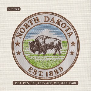 May include: Embroidered patch depicting the North Dakota state seal. The design features a bison in a green field, a blue sky, and the text "NORTH DAKOTA EST. 1889". The circular patch has brown and tan detailing.
