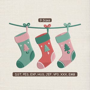 May include: Three embroidered Christmas stockings in shades of green, red, and pink hang from a green string. Each stocking features a Christmas tree design and star accents. The text "9 Sizes" and embroidery file formats are also visible.